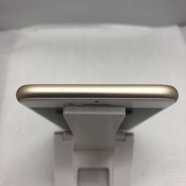 APPLE 〔中古〕iPhone7 128GB ｺﾞｰﾙﾄﾞ MNCM2J/A docomo対応端末（中古
